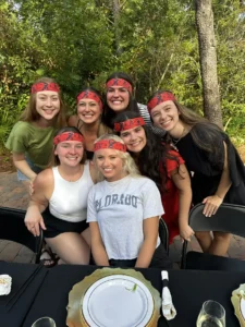 Friends wearing My Hibachi headbands during a private chef party at 30A backyard hibachi.
