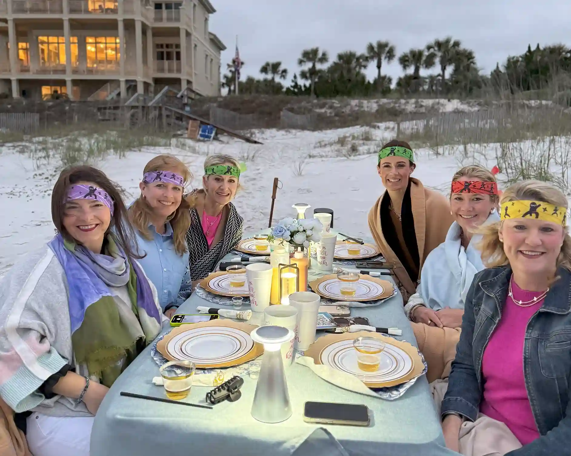 Women at bachelorette hibachi dinner on Alys Beach with custom setup and oceanfront view