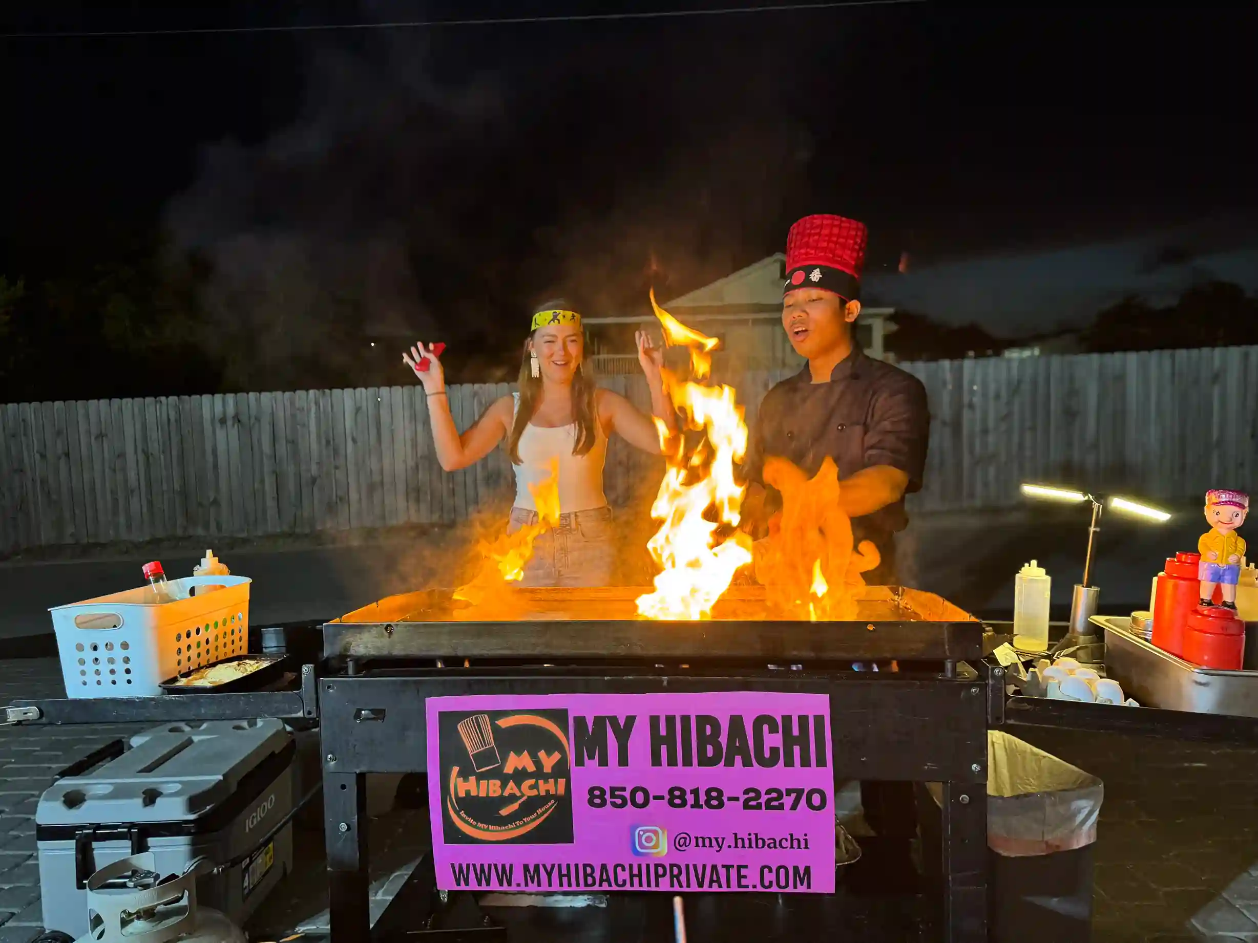 Group enjoying private hibachi dinner at a Panama City Beach vacation rental