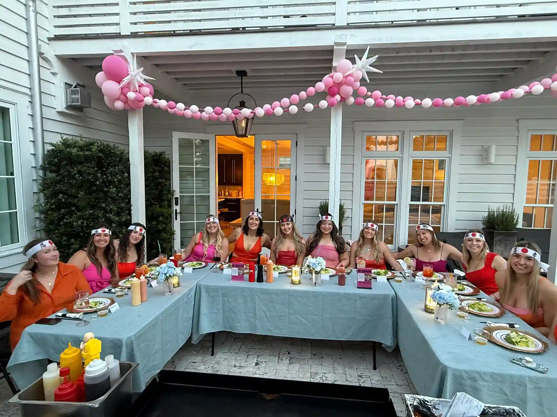 Bachelorette enjoying Hibachi 30A party with private chef and fun dinner setup